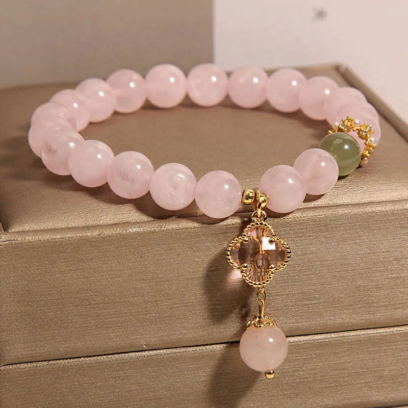 Pink crystal women's bracelet with four-leaf clover pendant and alloy gemstone inlay