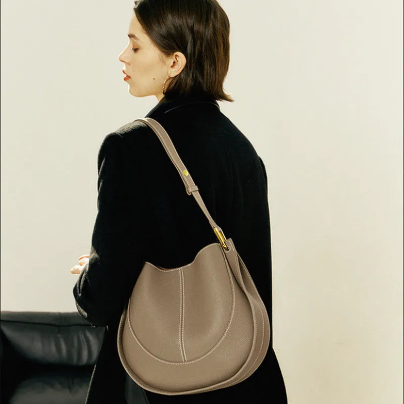 Designer small crossbody bag for women in genuine top grain leather with retro splicing detail