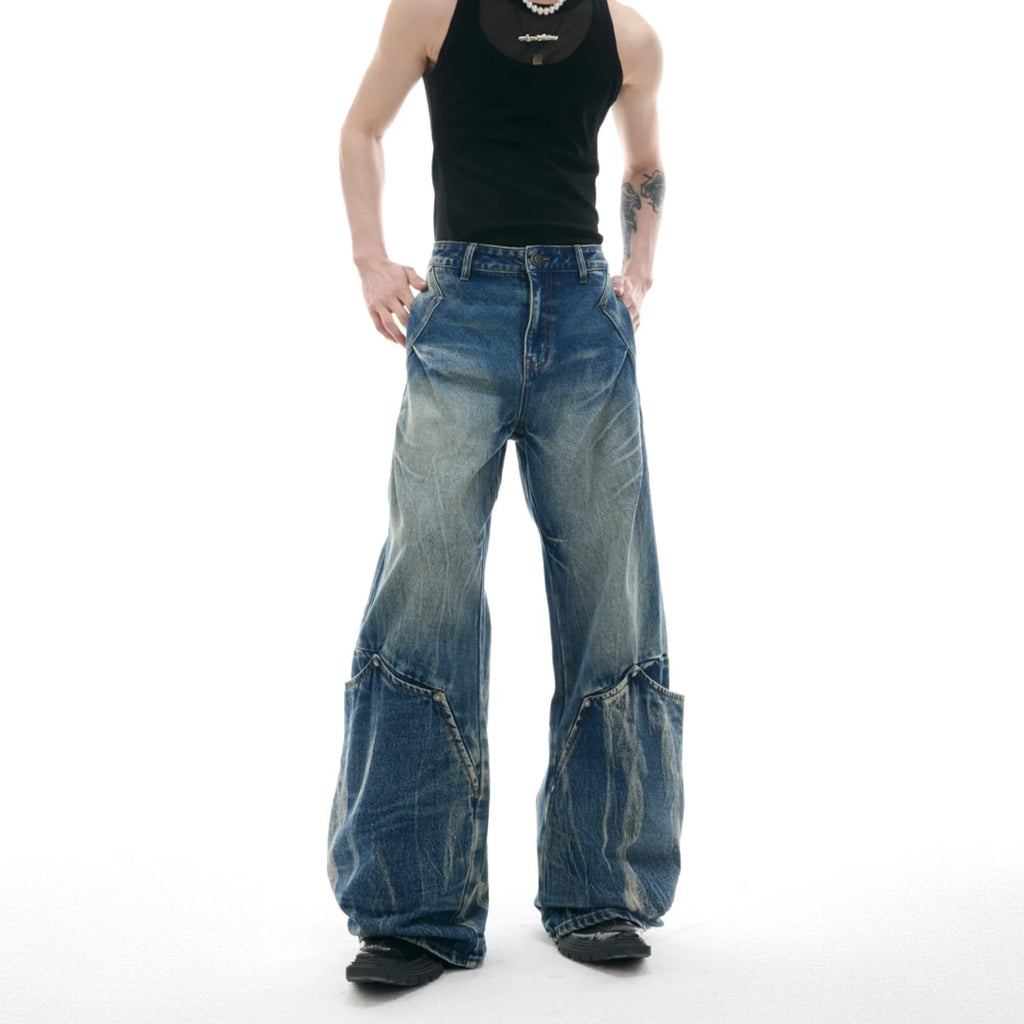 Men's retro washed burst pattern jeans with curved knife detailing in verdant blue colour