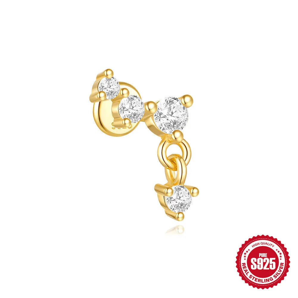 S925 sterling silver geometric moon and star earrings with embedded diamonds on a gold background.