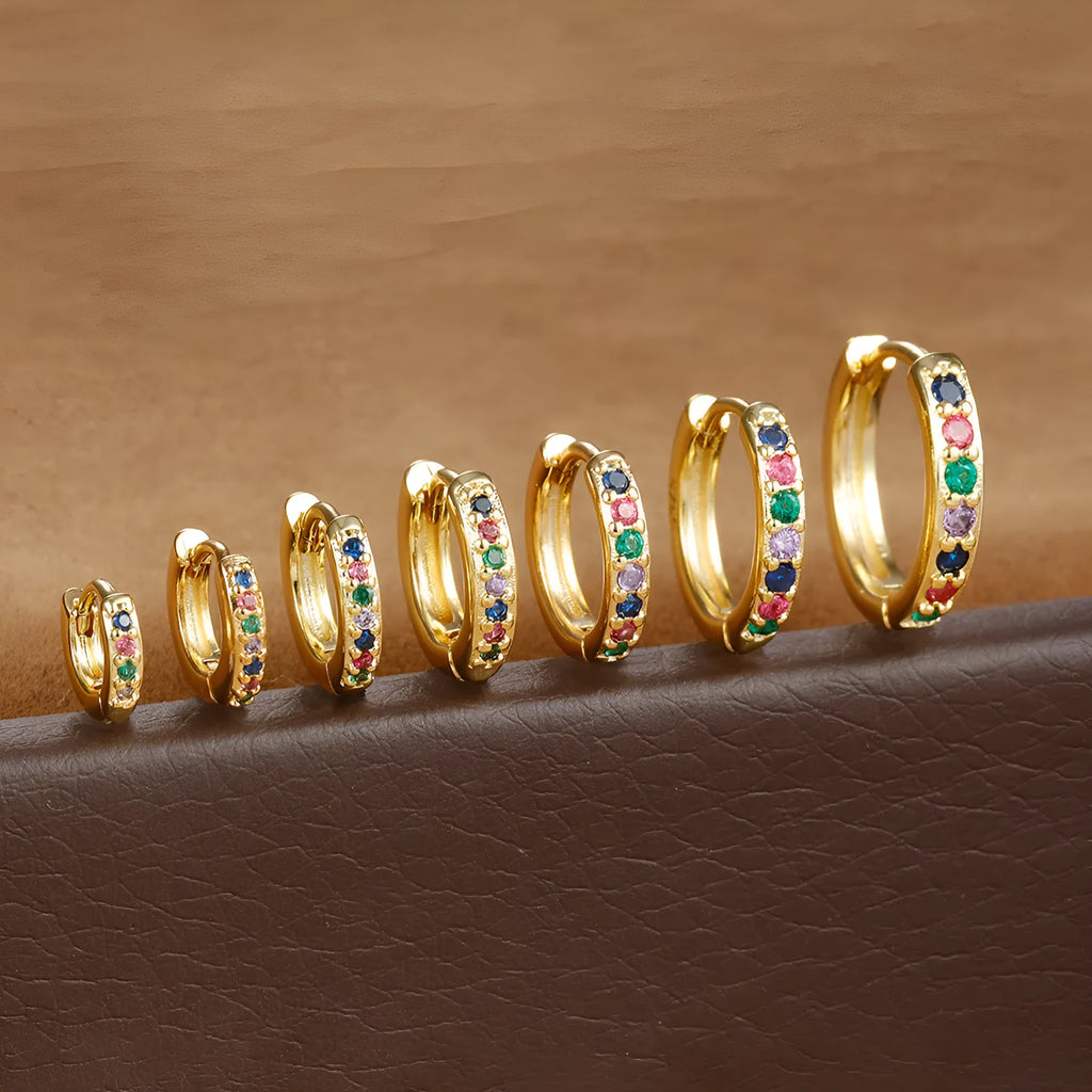 Geometric perforated stud earrings with circle zircon decoration in gold, rose gold and silver colours