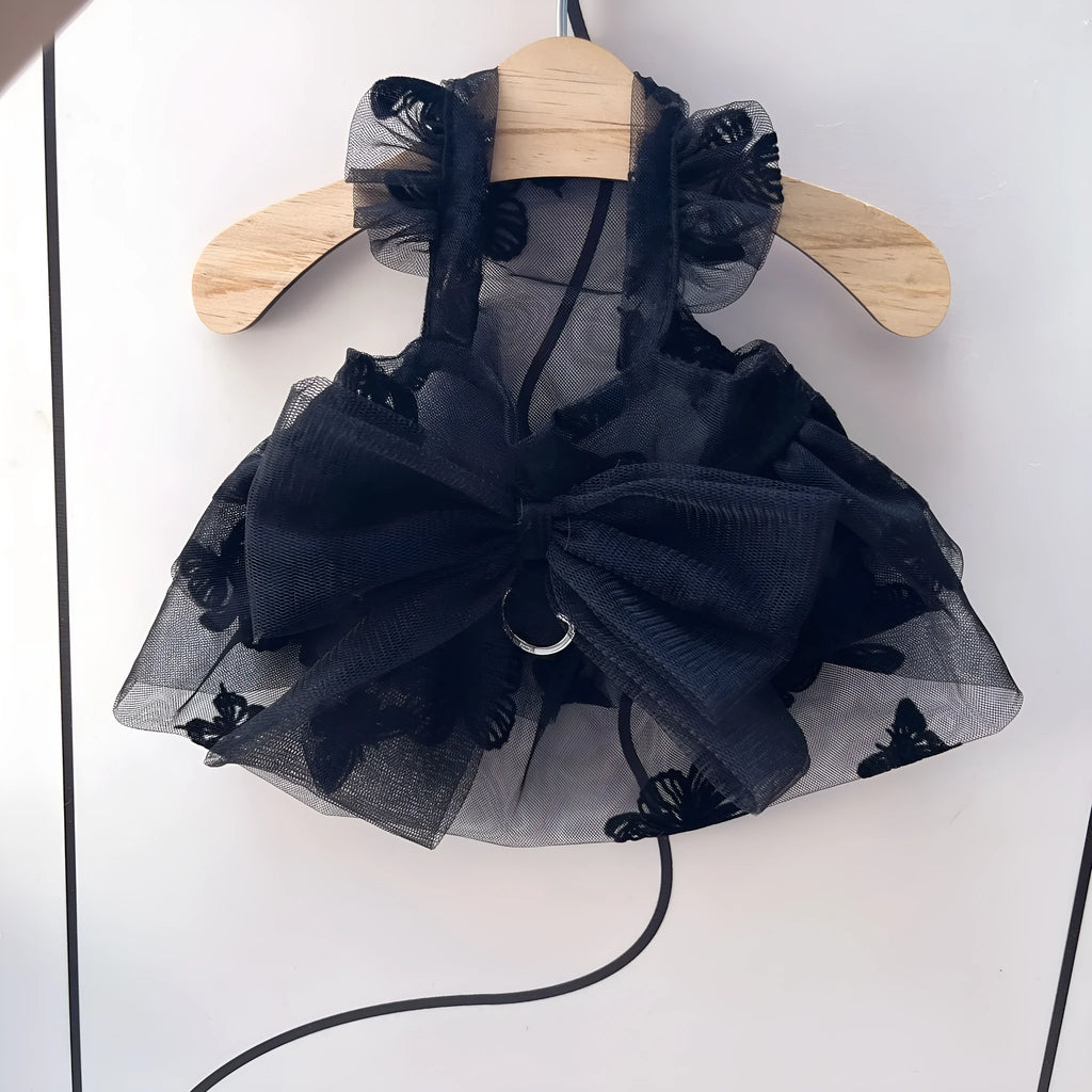 Black gauze tulle princess skirt costume on a small dog, showing the layered skirt and fitted bodice.