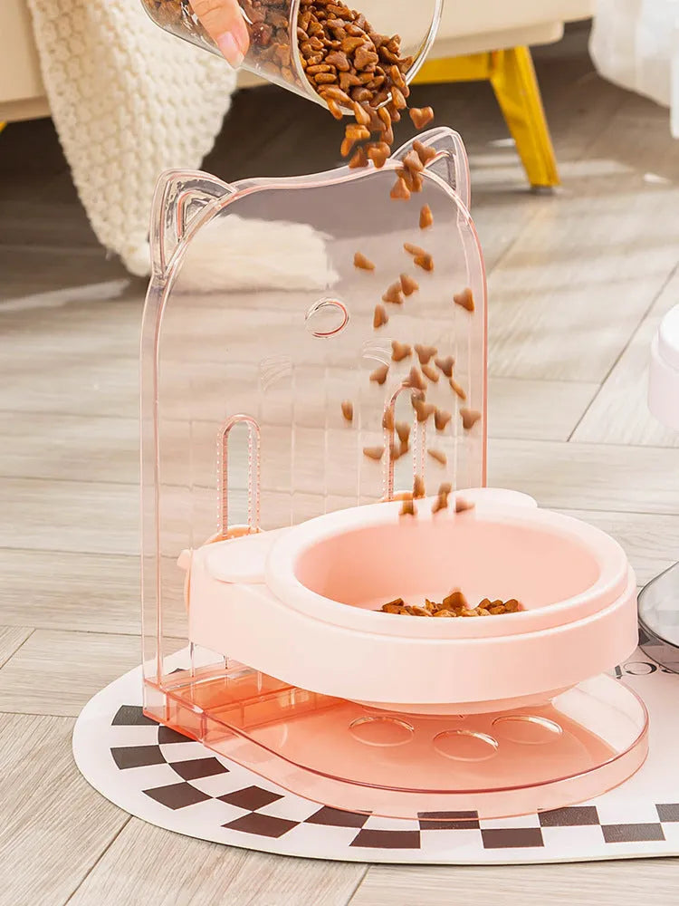 Grey cat bowl with anti-spill cat ear edges and removable hanging cage attachment for pet enclosures