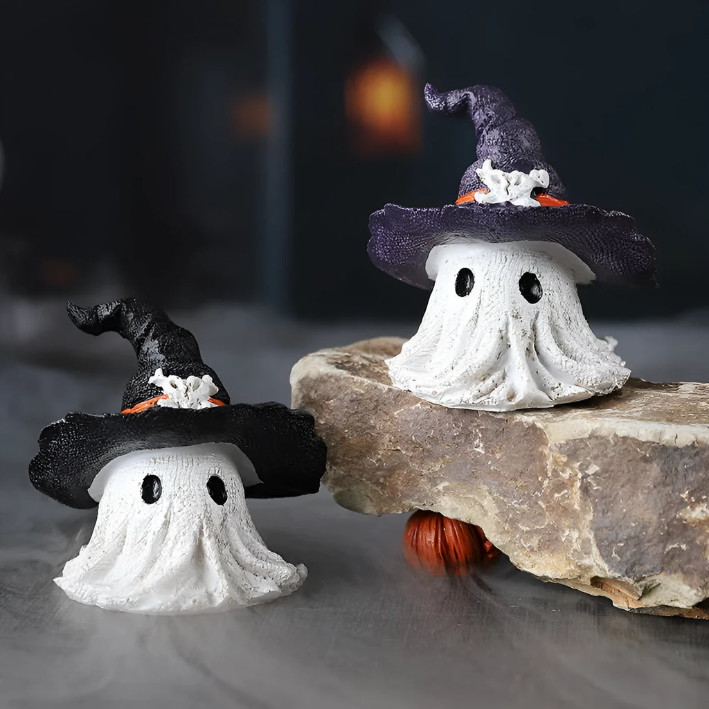 Purple and black resin wizard hat Halloween ghost ornament for holiday decorating.