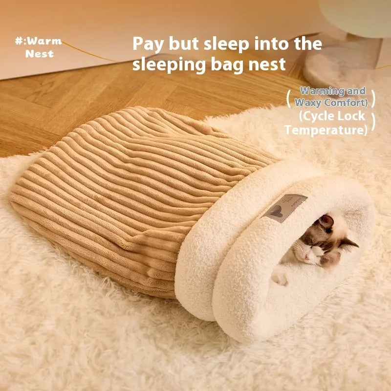 Brown semi-enclosed pet sleeping bag with plush lining on a wooden floor.
