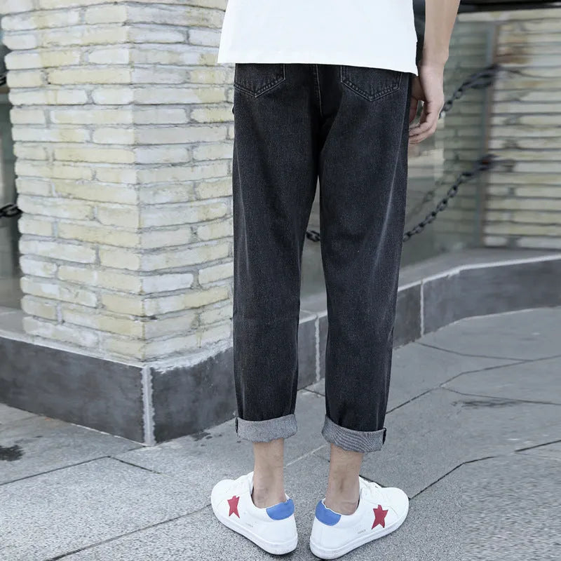 Men's loose fit straight leg cotton jeans in black or blue for casual spring autumn wear