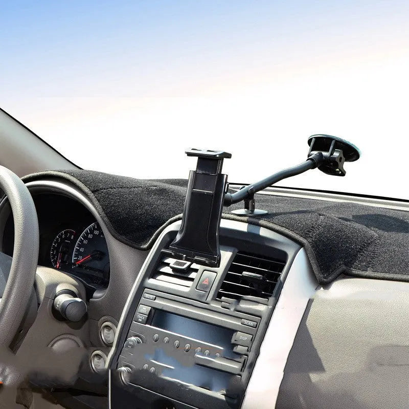 Black vehicle-mounted tablet holder with long-rod suction cup for 4-12 inch devices on a car dashboard.