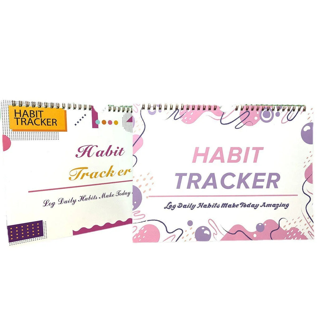 A5 habit tracking planner book open on a table, showing interior pages for schedule recording.