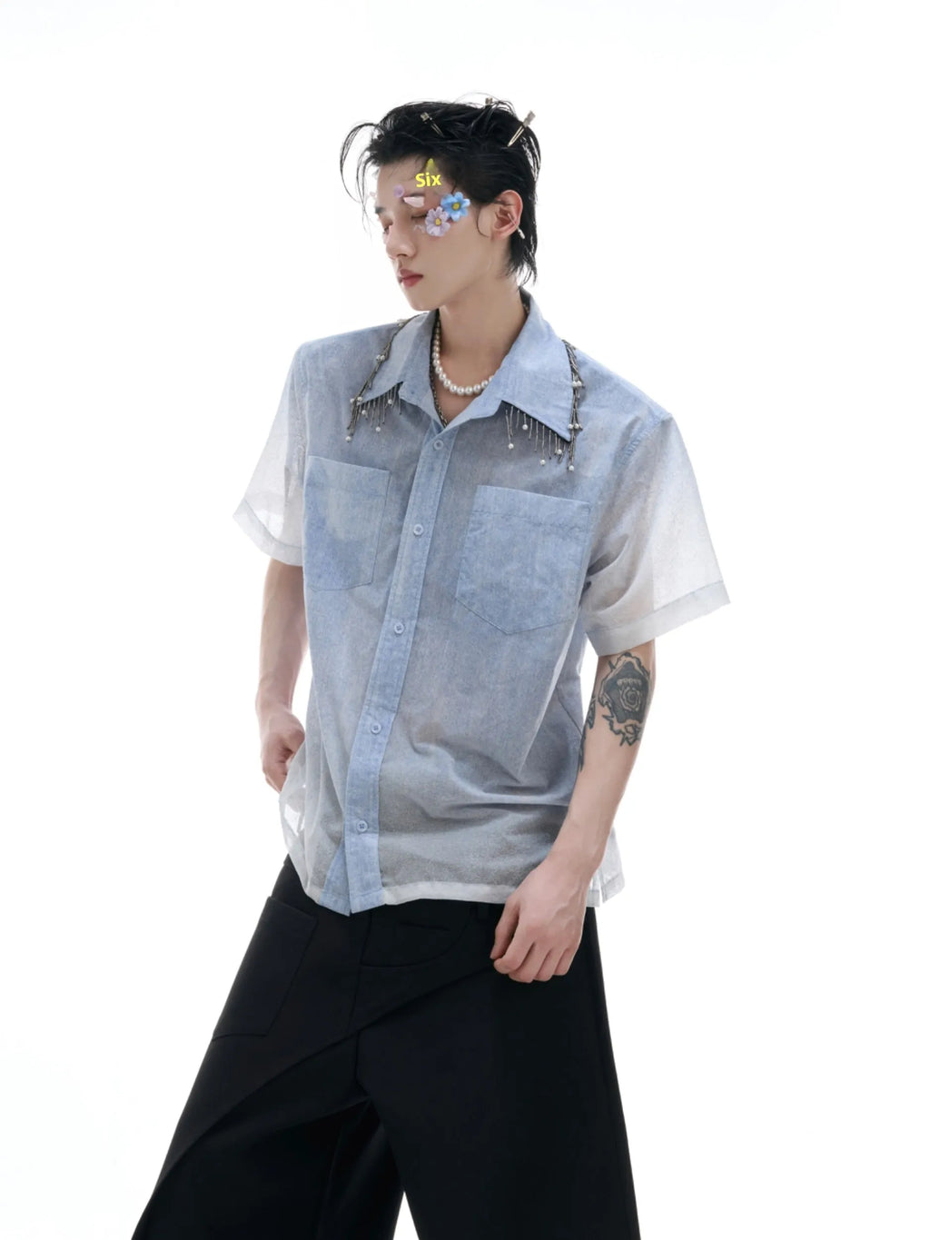Man's blue and white gradient short-sleeve casual shirt on a hanger