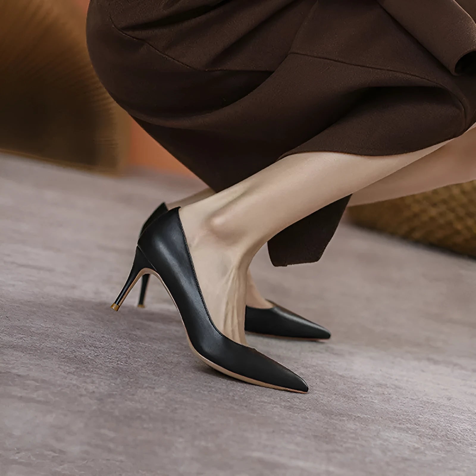 Black pointed toe high heel shoes with stiletto heel on white background