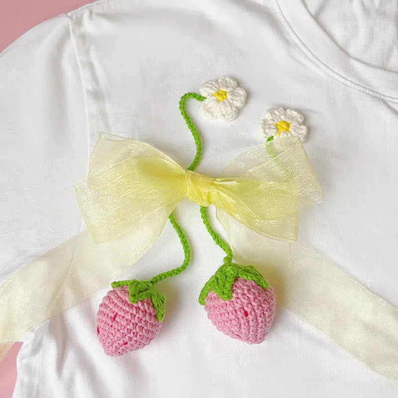 Wool crochet strawberry pendant necklace with knitted texture and 35cm length