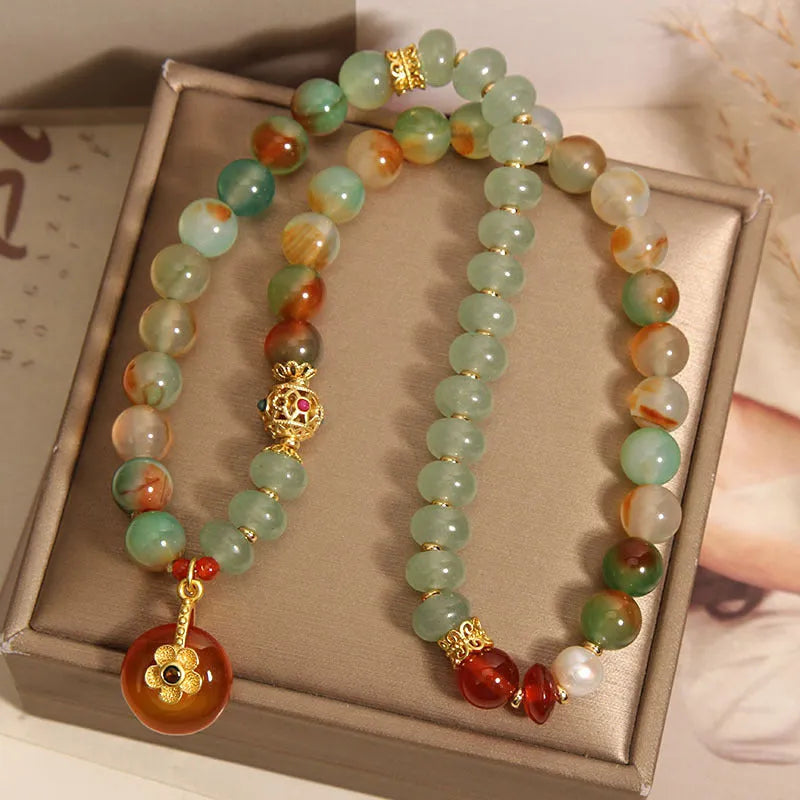 Peacock green agate double ring bracelet with safety buckle pendant and rhinestone detailing