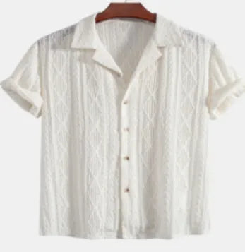 Man wearing a loose, short-sleeve cardigan in a solid colour, suitable for casual summer wear.