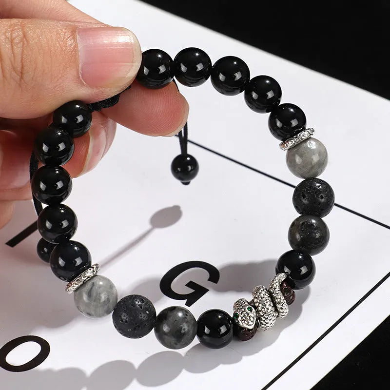 Black and white agate couple bracelets with snake clasps, turquoise accents, and glitter beads
