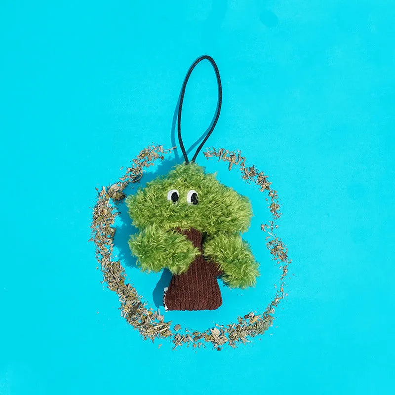 Pine tree-shaped cat toy bag pendant infused with cat mint, shown in three sizes