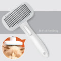 Blue automatic pet hair removal comb for dogs and cats on a white background.