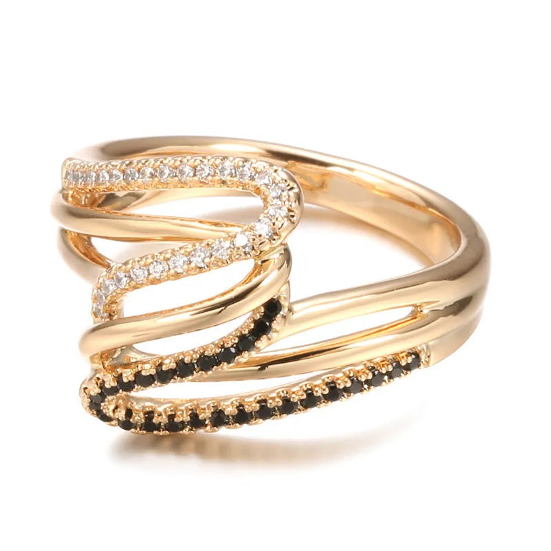 Close-up of a women's copper ring with micro-inlaid zircon stones and a silver-toned electroplated finish.