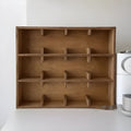 Solid wood cup storage rack with square grids in birch wood meridian colour