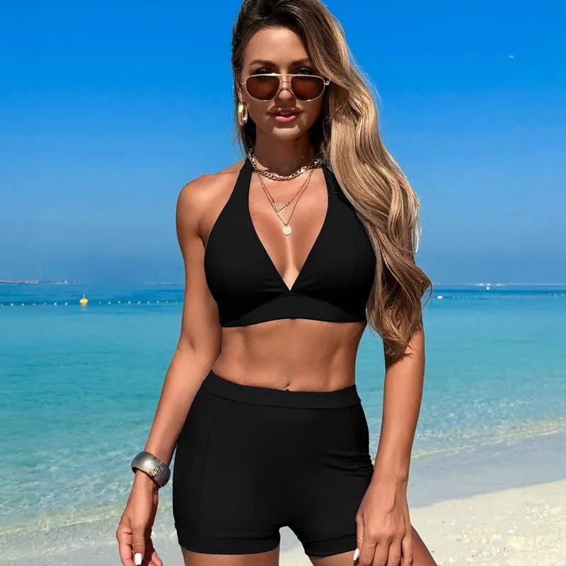 Women's two-piece nylon bikini swimsuit shown in one of four colour options: black, royal blue, pink, or purple blue.