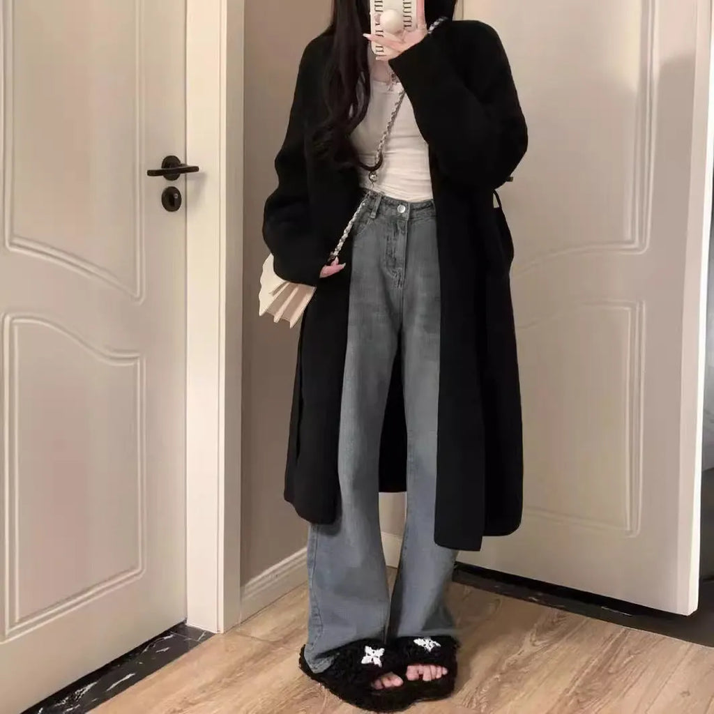 Women's khaki knitted V-neck cardigan with long sleeves, shown on a model.