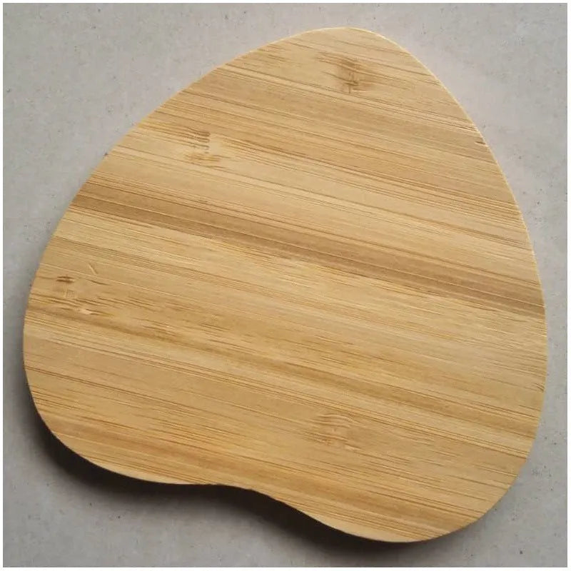 Square wooden bamboo 5W Qi wireless charging pad on a table