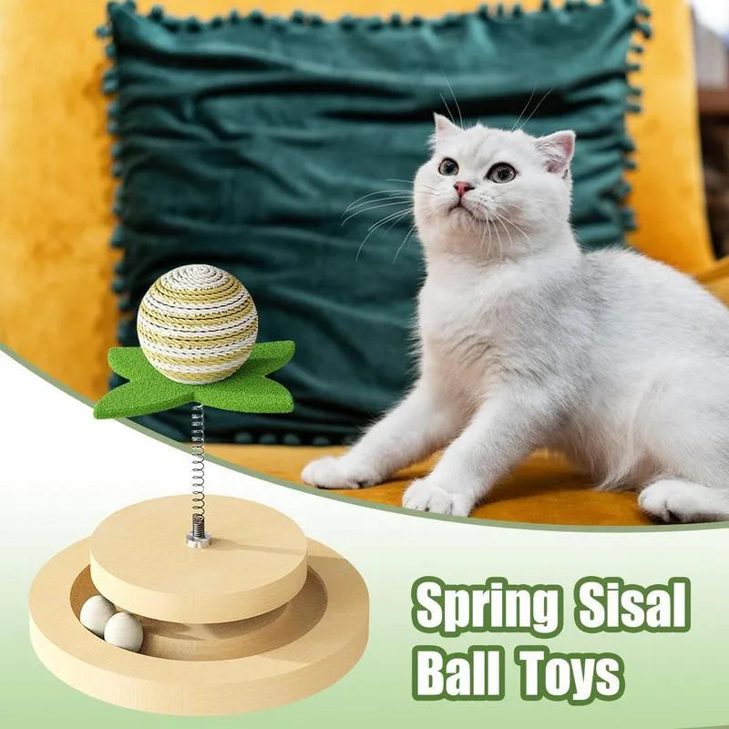 Green sisal scratching pad cat toy with multi-layer circular ball tracks containing rotating balls
