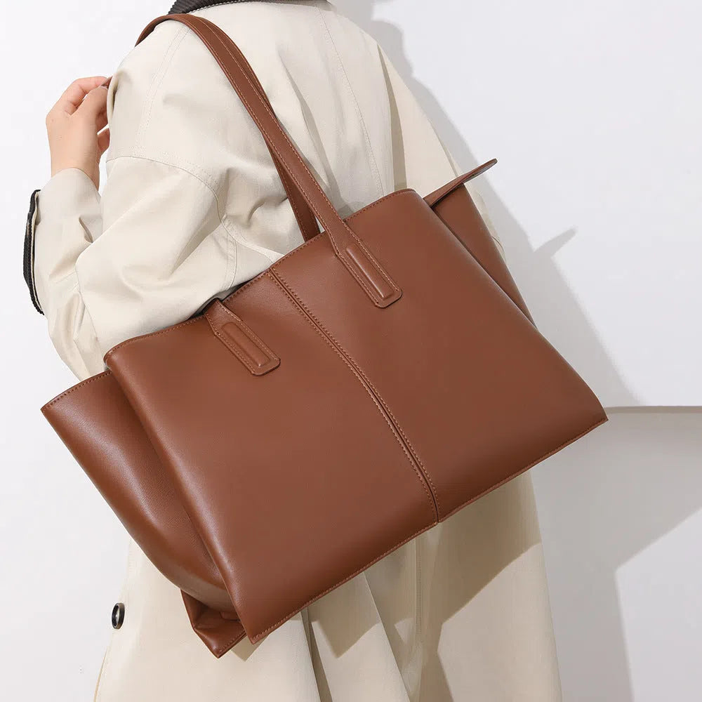PU leather large-capacity horizontal rectangle bag in urban minimalist style with stitched seams and double shoulder straps