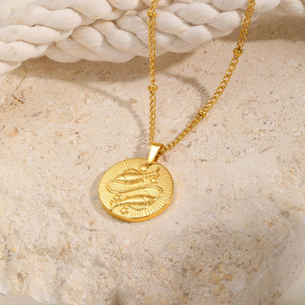 Stainless steel zodiac constellation bead necklace with embossed designs and cross chain