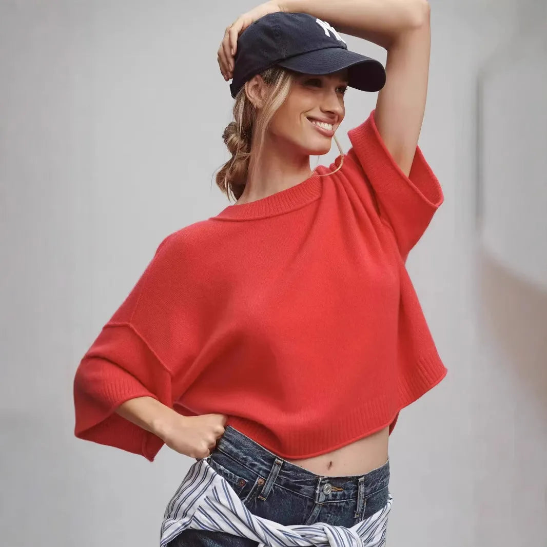 Red solid colour hot girl style T-shirt with an exposed navel crop top design on a mannequin.