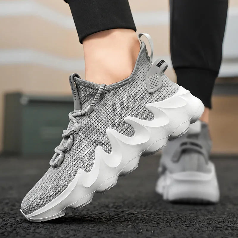 Men's black sock-like low-top sport shoes with a flat heel and round toe on a white background.