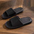 Pair of solid colour rhombus striped non-slip EVA foam indoor slippers