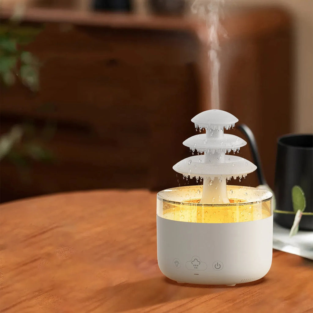 White Cloud Rain USB air humidifier and essential oil diffuser with colourful LED lights on