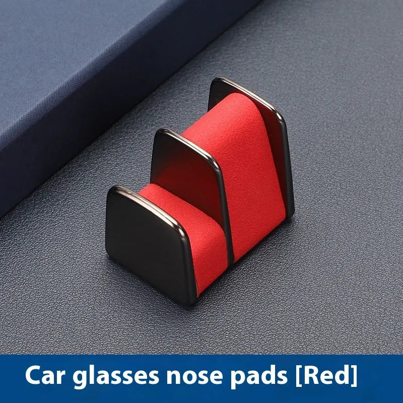Zinc alloy and leather car dashboard glasses clip holder in green colour.