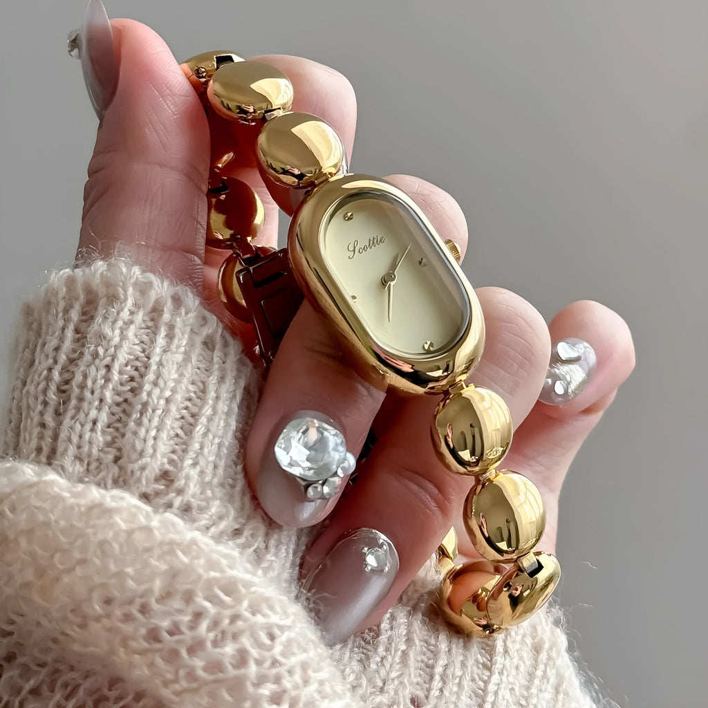 Women's oval gold fashion watch bracelet with 9mm thickness in seven colour options