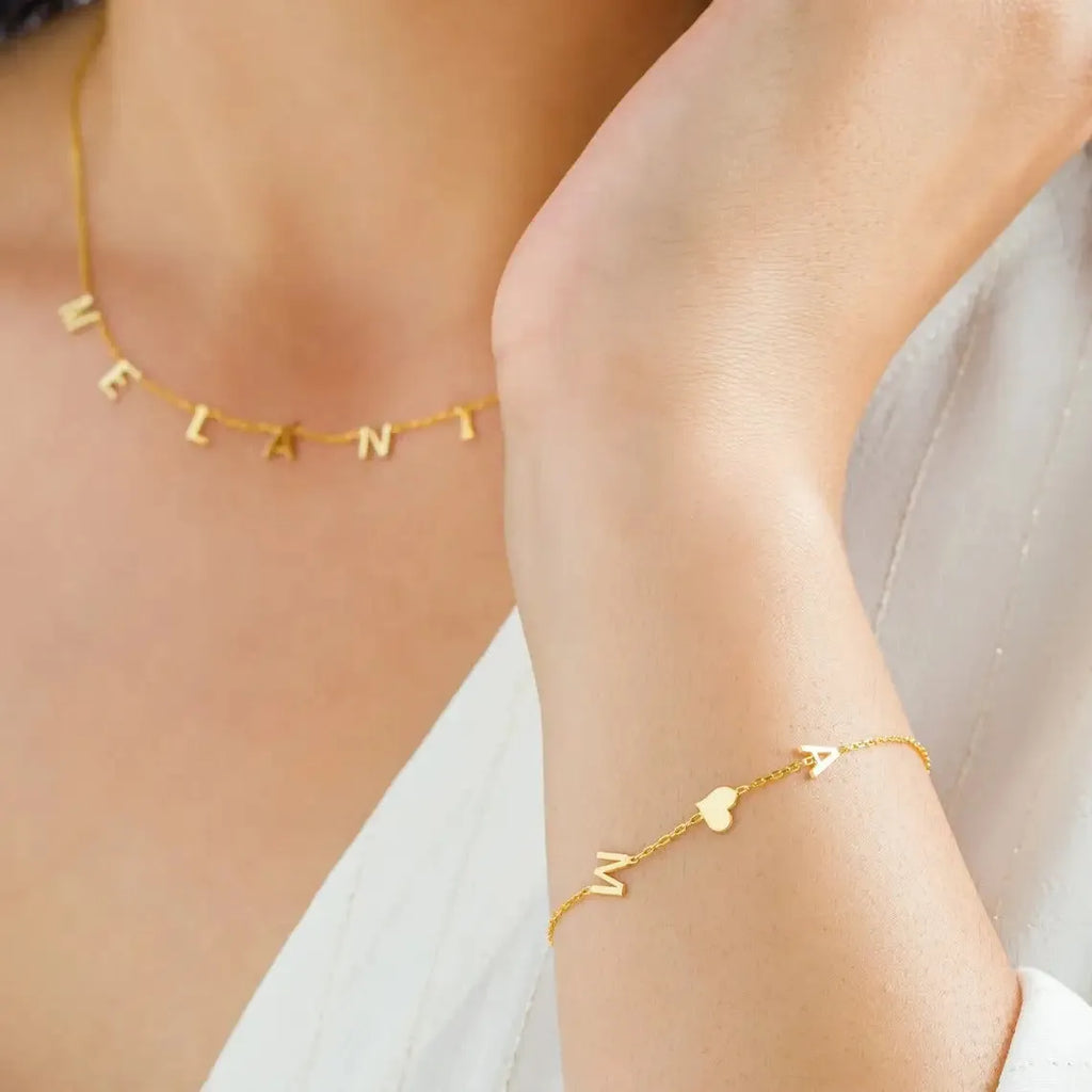 Gold stainless steel custom name bracelet with heart charm and personalised initials