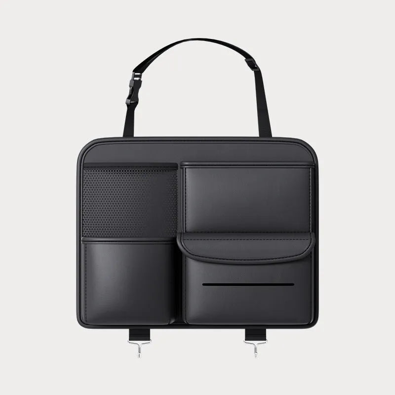 Black leather car seat back storage hanging bag with handle shown behind vehicle seat