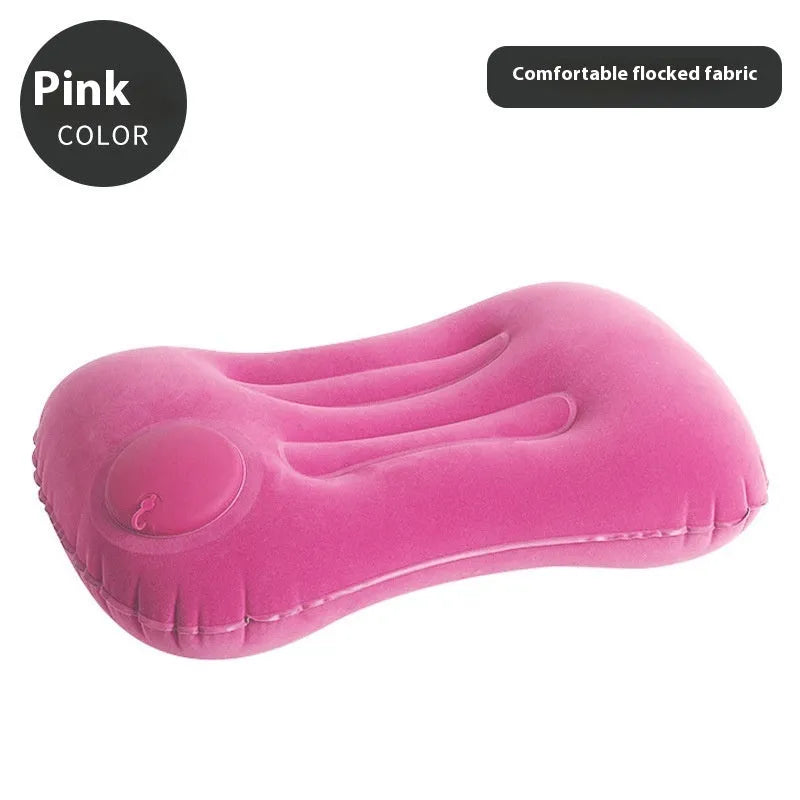 Inflatable travel pillow in grey flocking finish, shown inflated to its 45x30x13cm size with a soft texture.