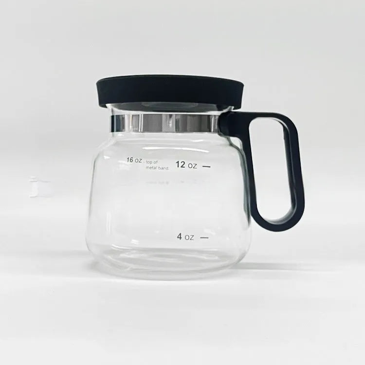 Transparent borosilicate glass coffee maker with silicone cover showing modern simplicity design