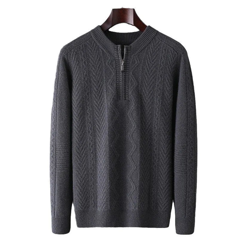 Men's grey diamond pattern wool sweater with a half zip neckline on a hanger.