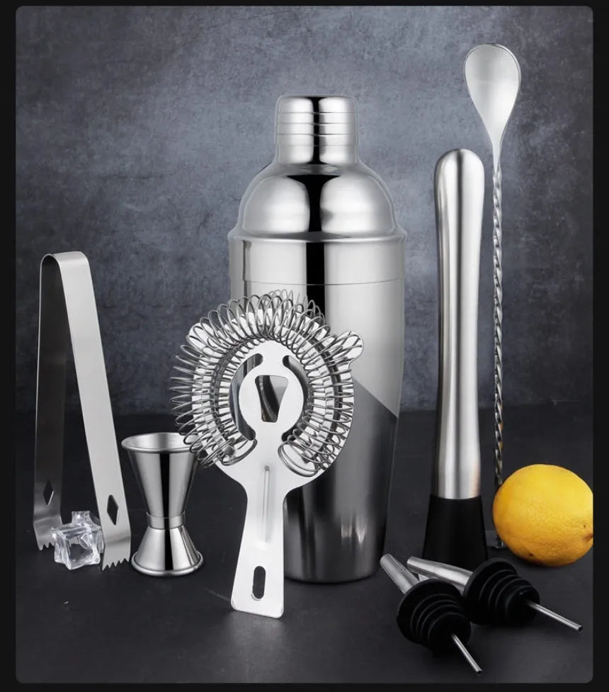 23-piece stainless steel cocktail set with European-style bar accessories including shaker, jigger, and mixing tools