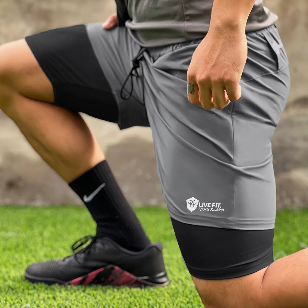 American style quick drying zippered shorts for men in grey, size M, front view