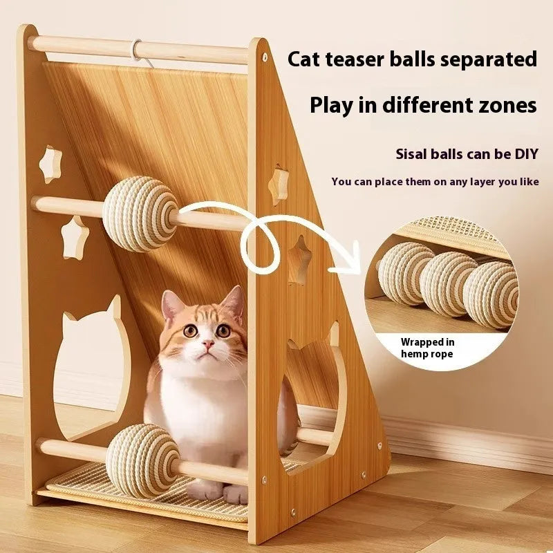 Vertical sisal cat scratch board with attached ball toy on hemp rope mounted on a wall.