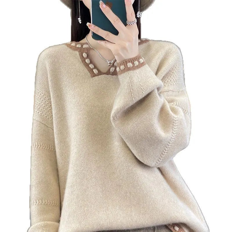 Women's white V-neck pullover sweater with regular long sleeves showing front view