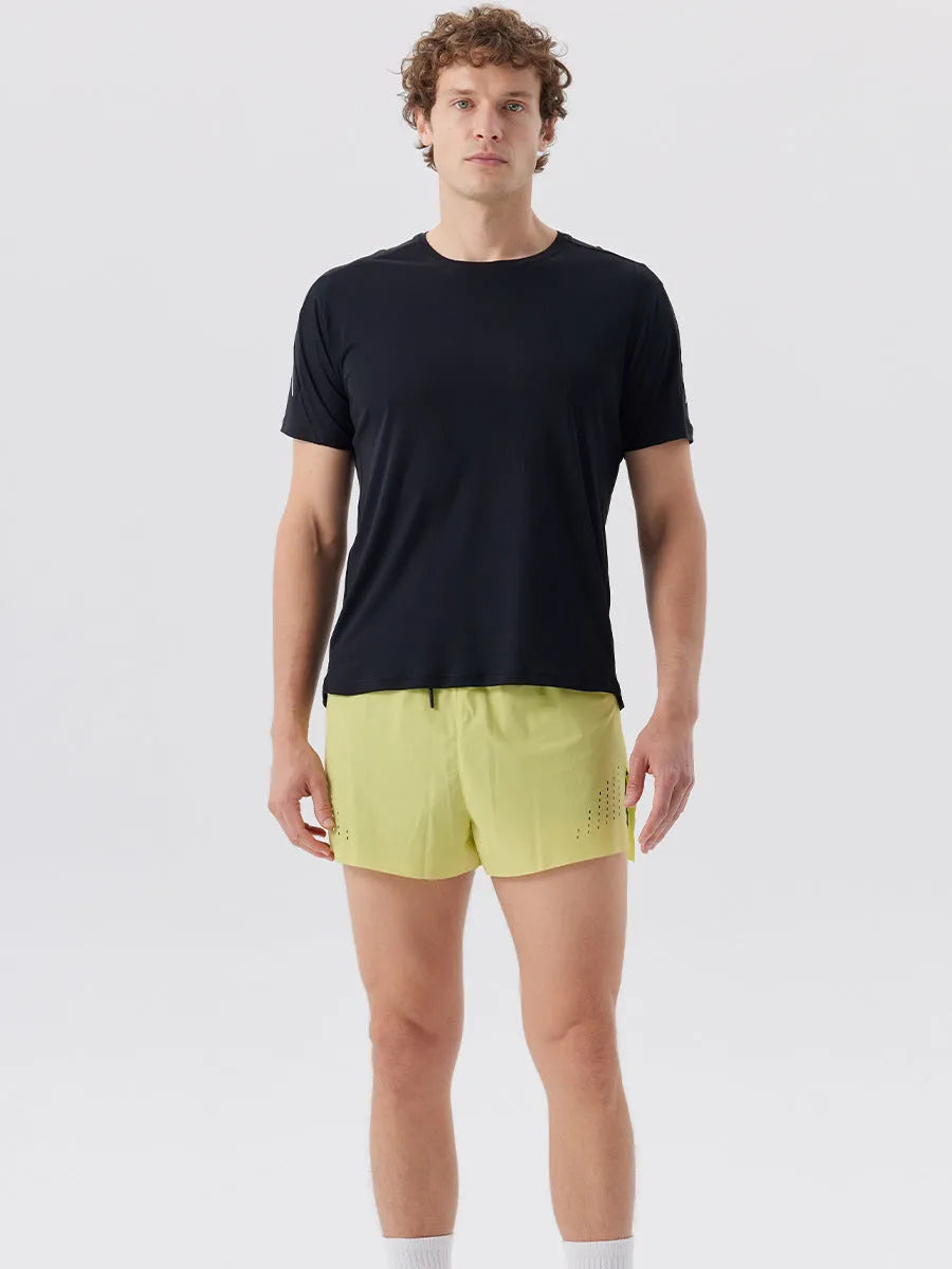 Men's straight-leg nylon sports shorts with side slits in turmeric yellow, night blue, and black.