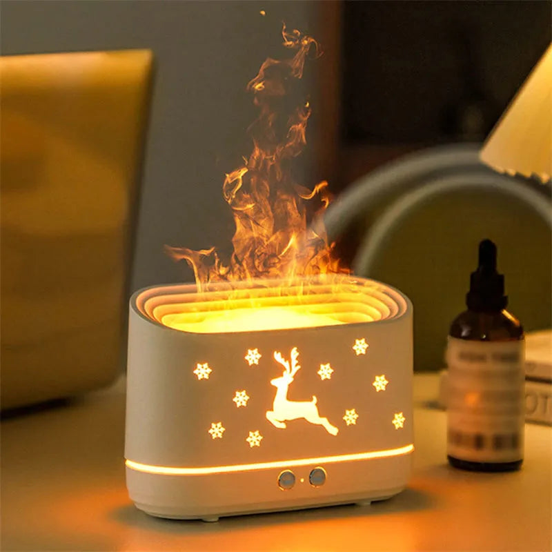 White flame effect humidifier diffuser with LED lighting and Christmas pattern, showing mist output