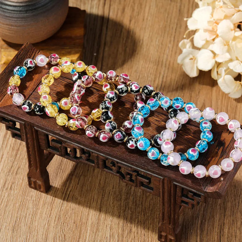 Handmade glass coloured glaze swallowing gold beast heart bracelet with 10mm charm
