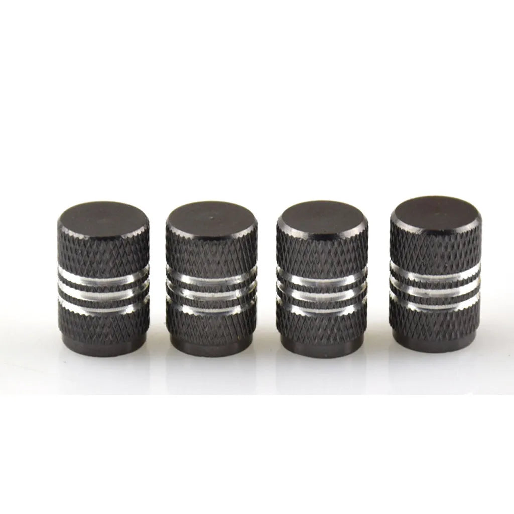 Set of coloured aluminium alloy car tyre valve caps in black, red, blue, gold, silver, green, purple, sky blue, grey, and orange