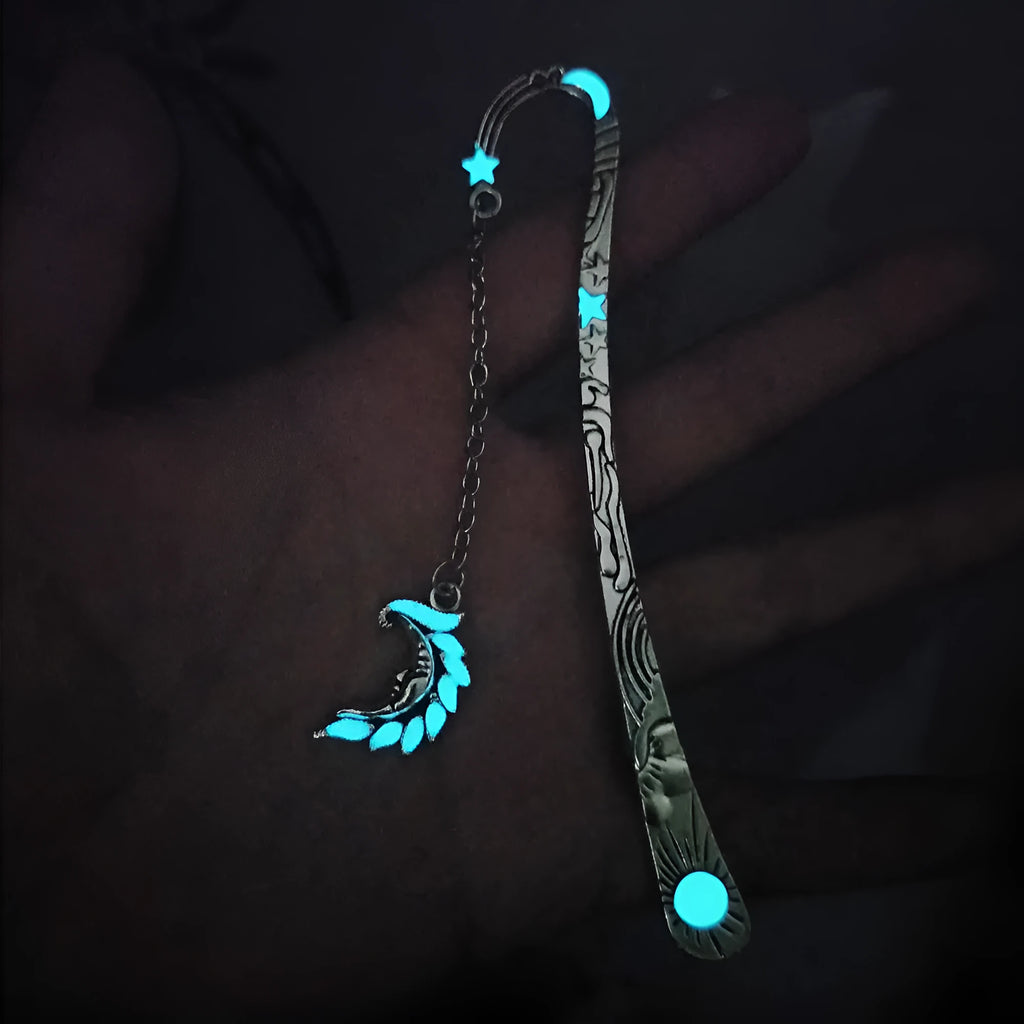 Retro five-pointed star metal bookmark glowing with celestial sun moon stars design