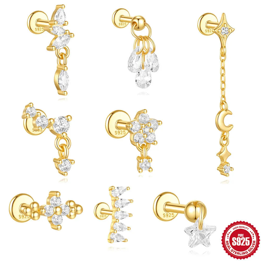 S925 sterling silver geometric moon and star earrings with embedded diamonds on a gold background.