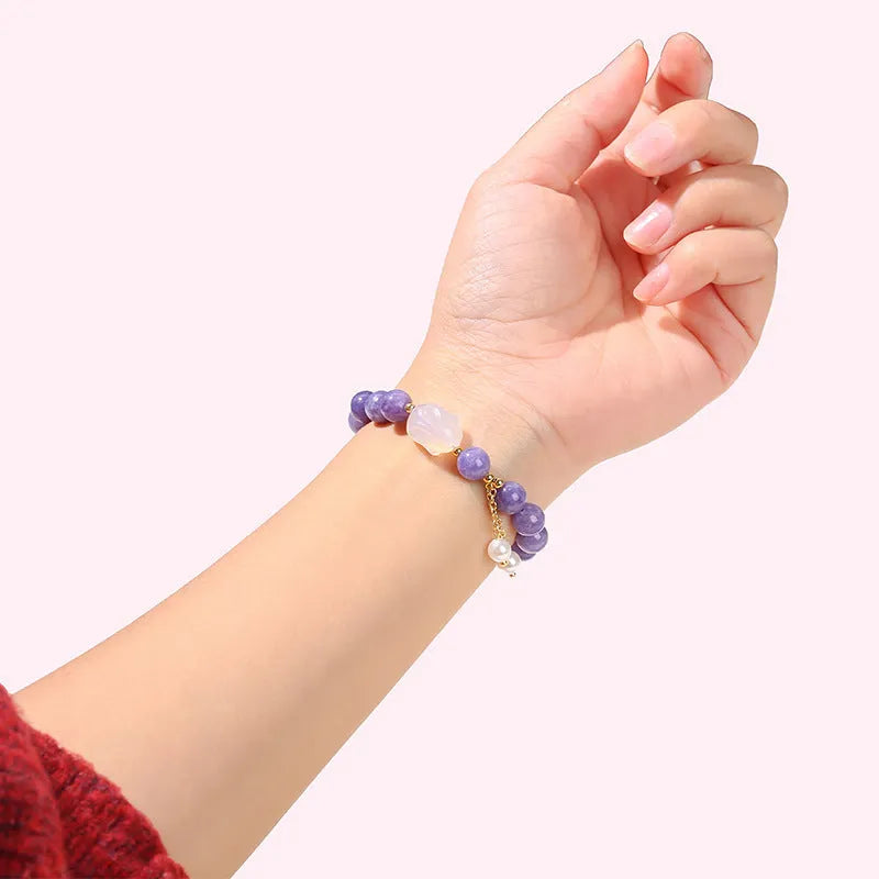 Purple aquamarine chalcedony bracelet with geometric beads and agate rabbit motif